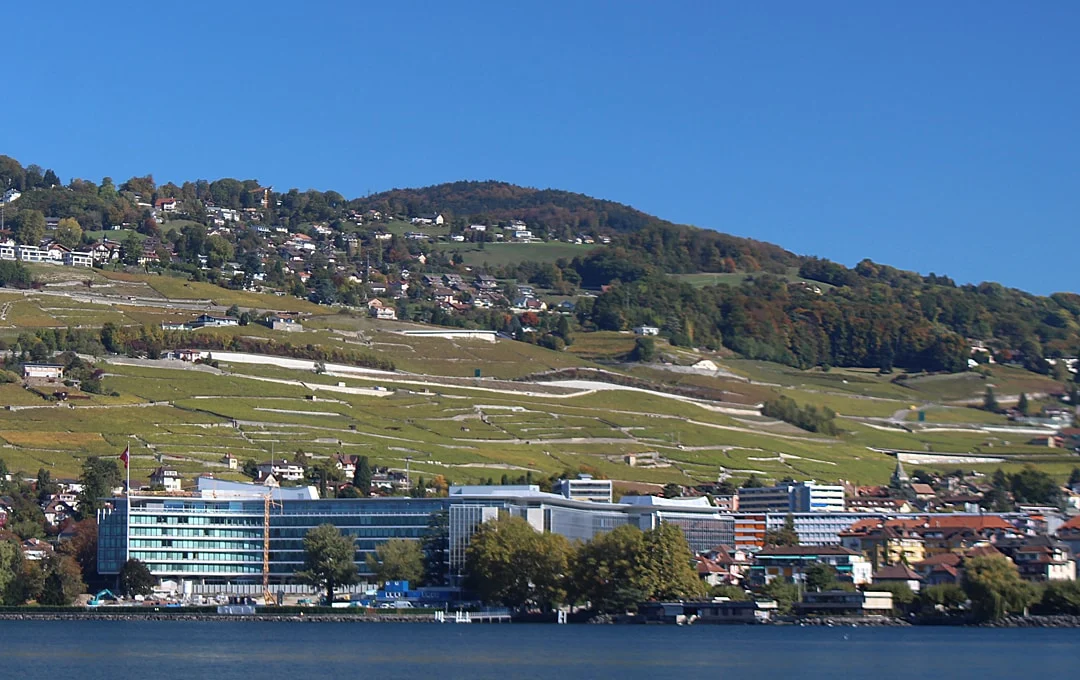 Food giant: Beneath the vineyards, Nestlé’s headquarters, Vevey on Lac Léman, Switzerland | Peter Ungphakorn CC SA-BY 4.0